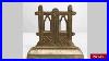 Antique-Pair-Of-American-Art-Deco-Iron-Open-Arch-Bookends-01-fqnt