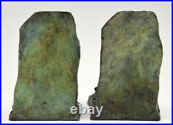 Art Deco French bronze bookends two men pushing Victor Demanet 1925