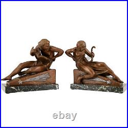 Art Deco bookends man with music book and woman with lyre Georges Van de Voorde
