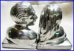 Art Deco bookends of Lovers in polished aluminum 5-1/4 tall a pair USA