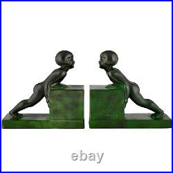 Art Deco child bookends little girls pushing a cube by Janle Max Le Verrier 1930