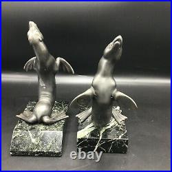 French Art Deco period spelter and marble seal book ends
