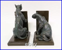 Gorgeous pair of bronze lioness art deco book ends on bronze bases