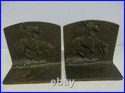 PAIR OF ANTIQUE HEAVY IRON BOOK ENDS with END OF THE TRAIL INDIAN