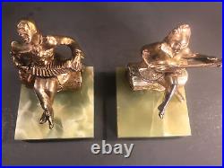 Pair of Art Deco bookends/Music/Onyx marble base/Gilt white metal/ C. 1940/Clown