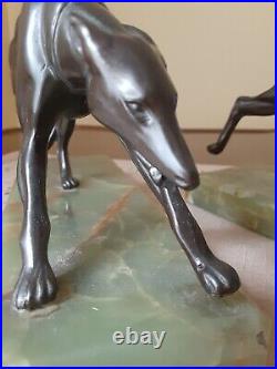 Pair of French Art Deco greyhound or whippet bookends. Onyx marble bases