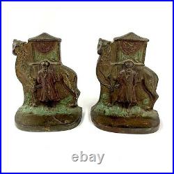 Vintage Cast Iron Middle East Arab Man Camel Bookend Set Early 20th Century 20s