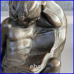 Vtg ART DECO S. MORANI Bronze Armour Bookends Cherub Child Reclining READ DESC